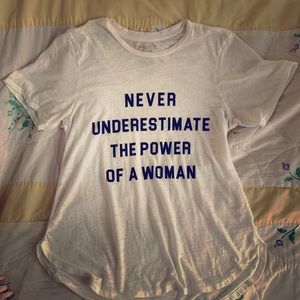 “NEVER UNDERESTIMATE THE POWER OF A WOMAN”